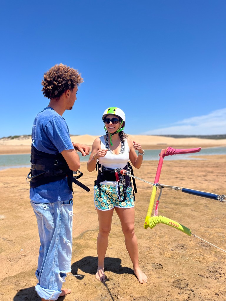 Kitesurf student holding control bar under blue sky at Essaouira