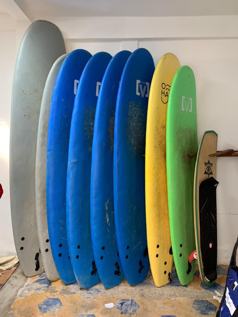 Colorful surfboards lined up at Essaouira surf school