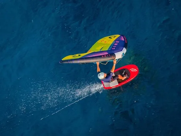 Aerial view of independent wing foiler on Essaouira water during a rental session
